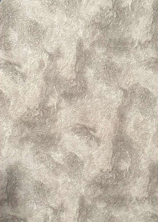 نسيج فاخر بلون رمادي مع لمسة أنيقة وفخمة يعكس جو من الأناقة والترف.